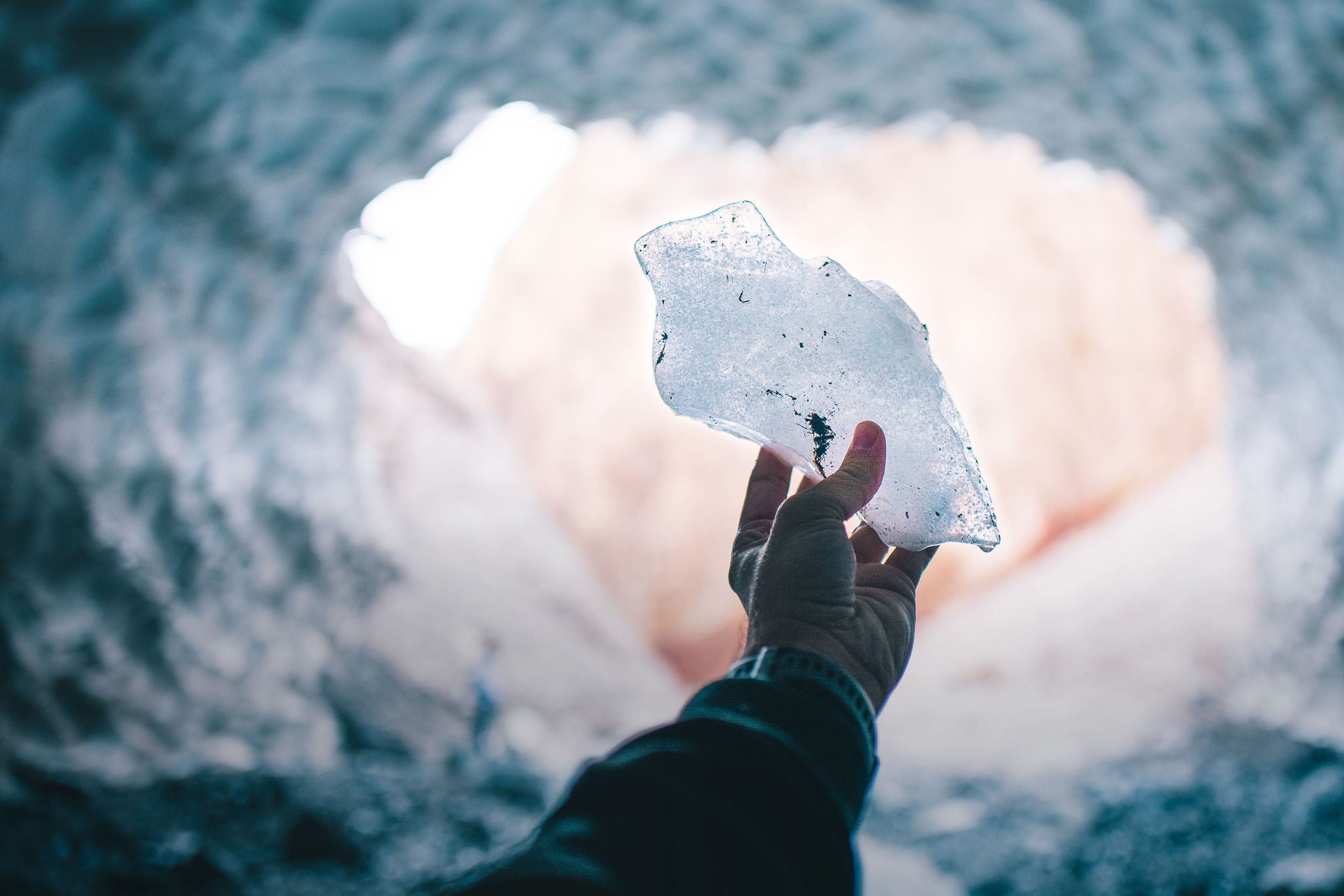 Close up view of hand holding ice